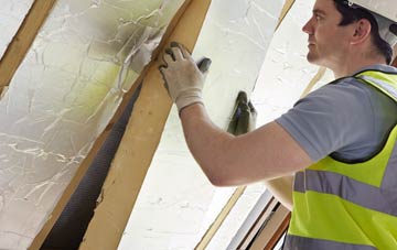 Staining loft insulation